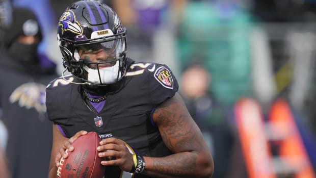 Ravens quarterback Anthony Brown warms up before a game.